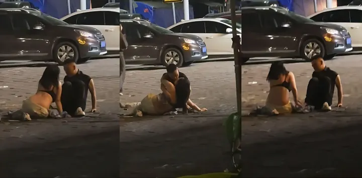 瓜友抓拍醉酒少妇深夜与男子当街拥吻，脱到只剩内裤，露着大奶让人随便摸，没人拦着估计就干上了